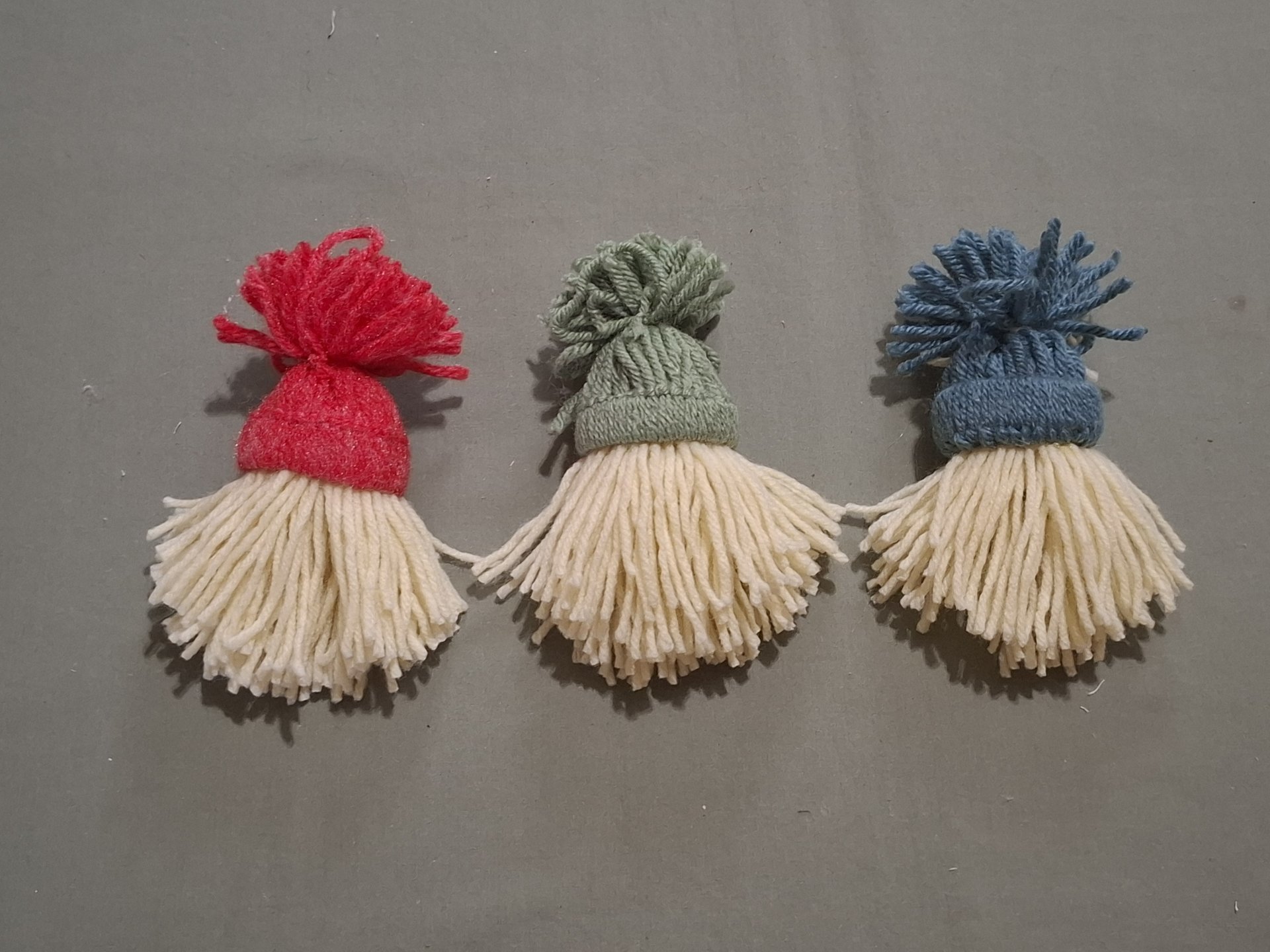 Three Handmade Gnome Yarn Ornaments, Home Decor, Made from Vintage Blue, Green and Red Yarn, Trims, Approx. 5" long.
